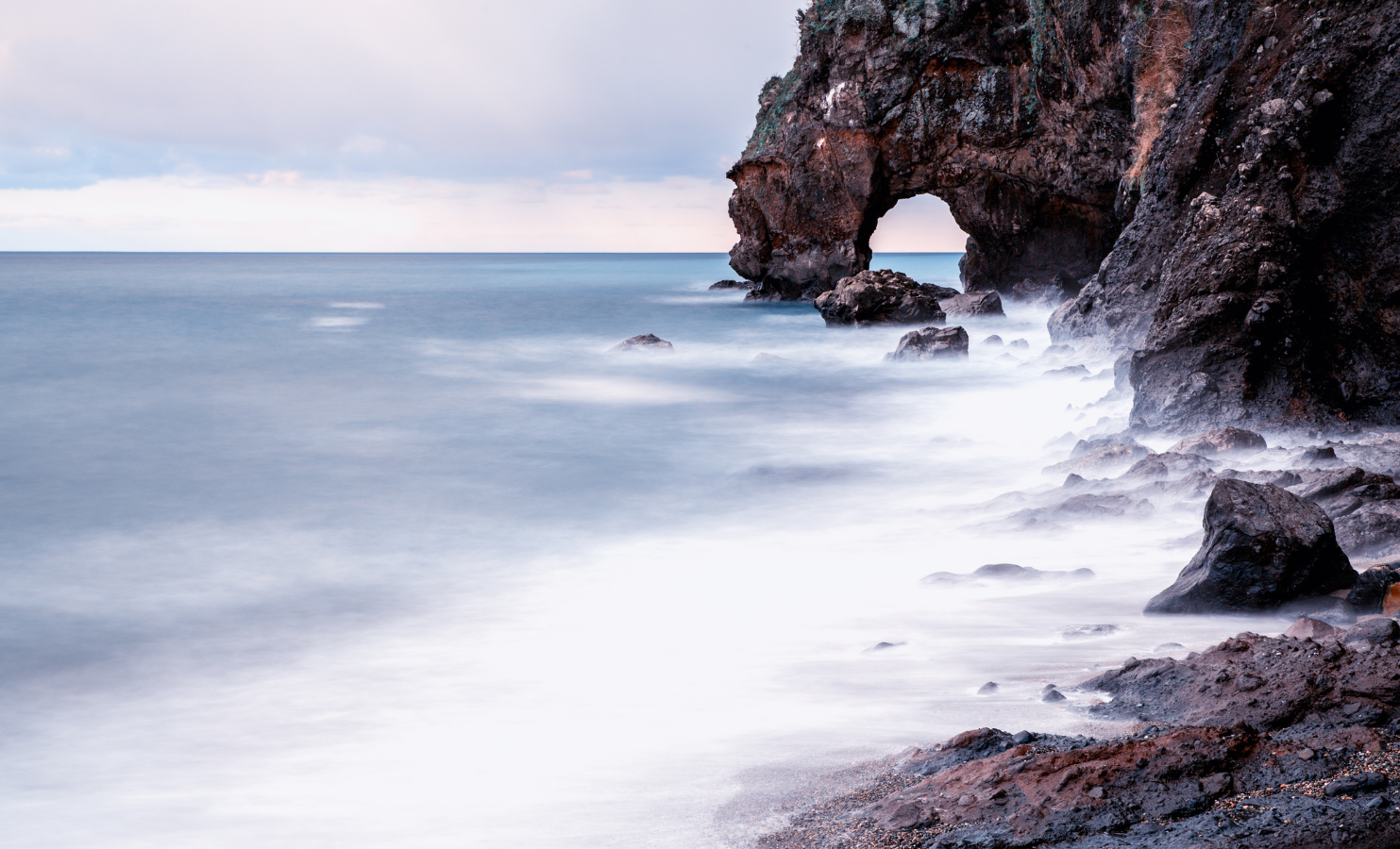 Waves crashing onto rocks
